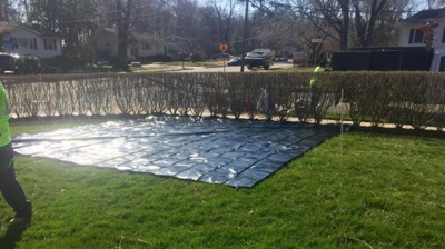 Tarp used to place excavated dirt during the job. Photo