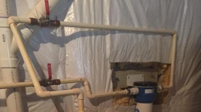 New booster pump and whole house water filter installed in Traingle, VA. Photo