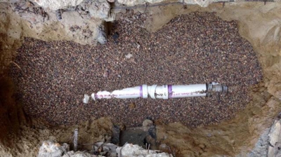 Pea Gravel Put Around Pipe to Secure Photo