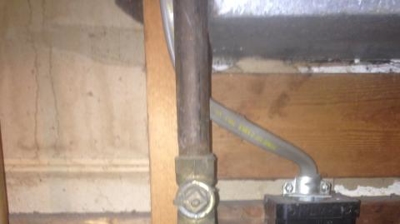 An open gas line with no cap leaving it vulnerable to a gas leak. Photo