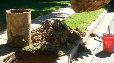 Pulling Water Meter Crock Photo