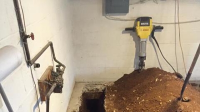 Hole Dug to Run New Sewer Line Photo