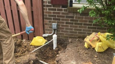 Beginning Careful Excavation of Sewer Line Photo