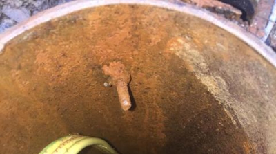 Well Casing with Wire and Rope Photo